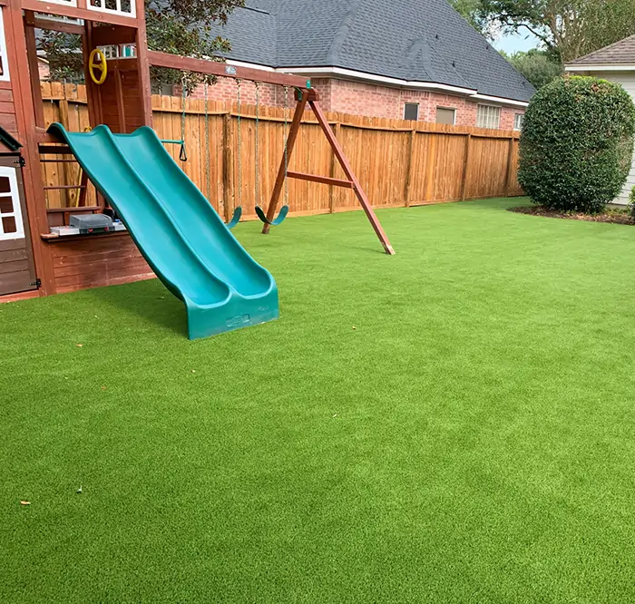 Backyard artificial grass playground installed by SYNLAwn